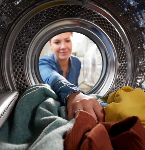 Why wash bedding inside out?